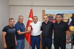 ASKF’DEN ÖZPERK’E HİZMET PLAKETİ