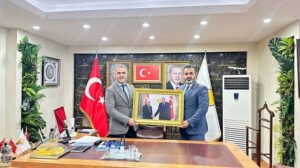 MHP’DEN, AK PARTİ’YE HAYIRLI OLSUN ZİYARETİ