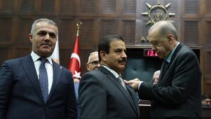 Tutuş’un rozetini Erdoğan taktı